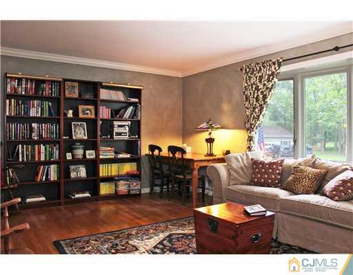 3 Devon Road Edison, NJ 08820 - Photo 4 of 17 a living room with furniture and a large window