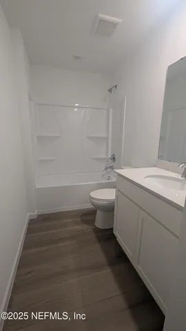 an empty room with a empty space and window