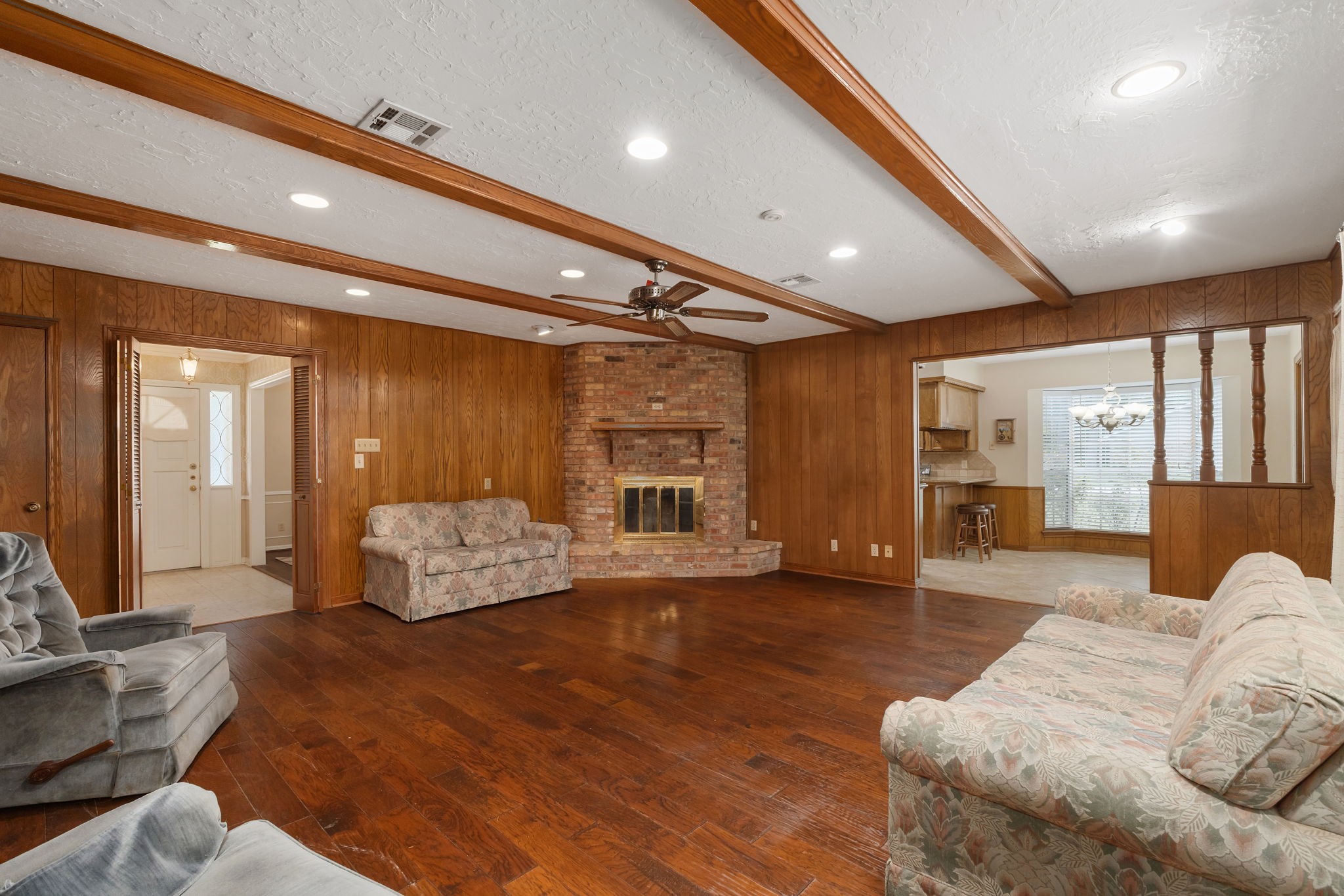 460 Dover Lane Spring, TX 77373 - Photo 19 of 47 a living room with furniture and wooden floor