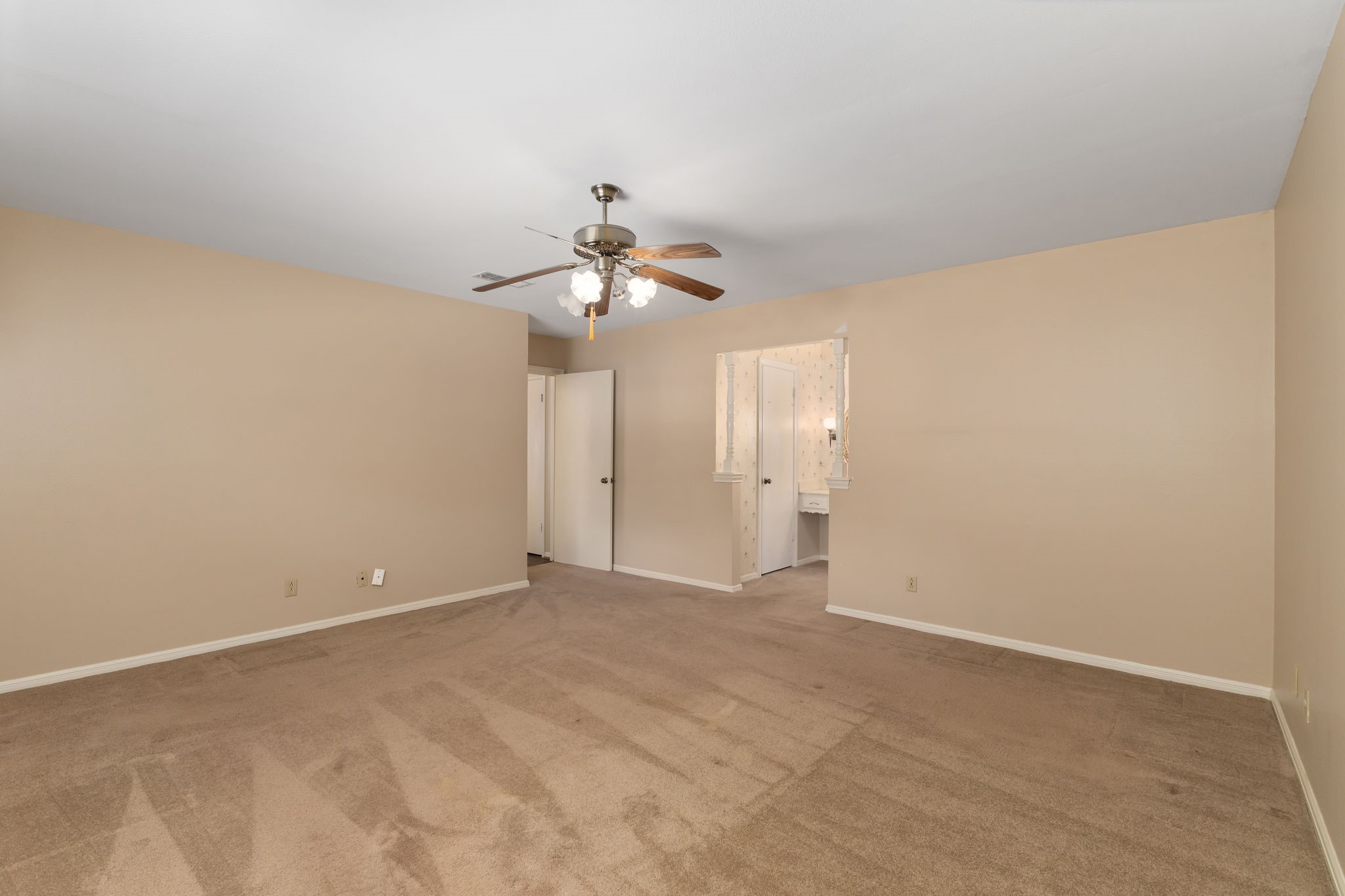 460 Dover Lane Spring, TX 77373 - Photo 21 of 47 a view of an empty room with a chandelier fan