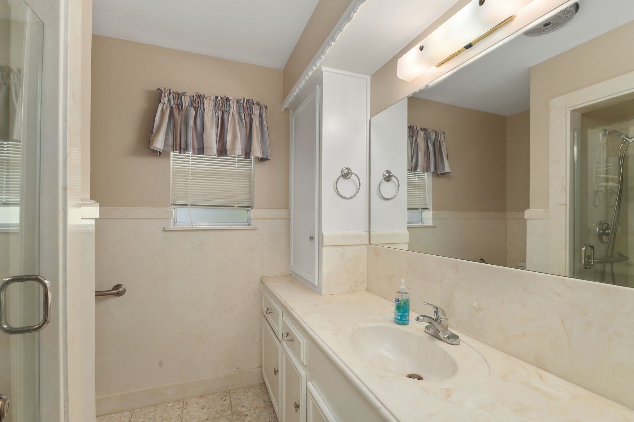 460 Dover Lane Spring, TX 77373 - Photo 24 of 47 a bathroom with a sink vanity and mirror