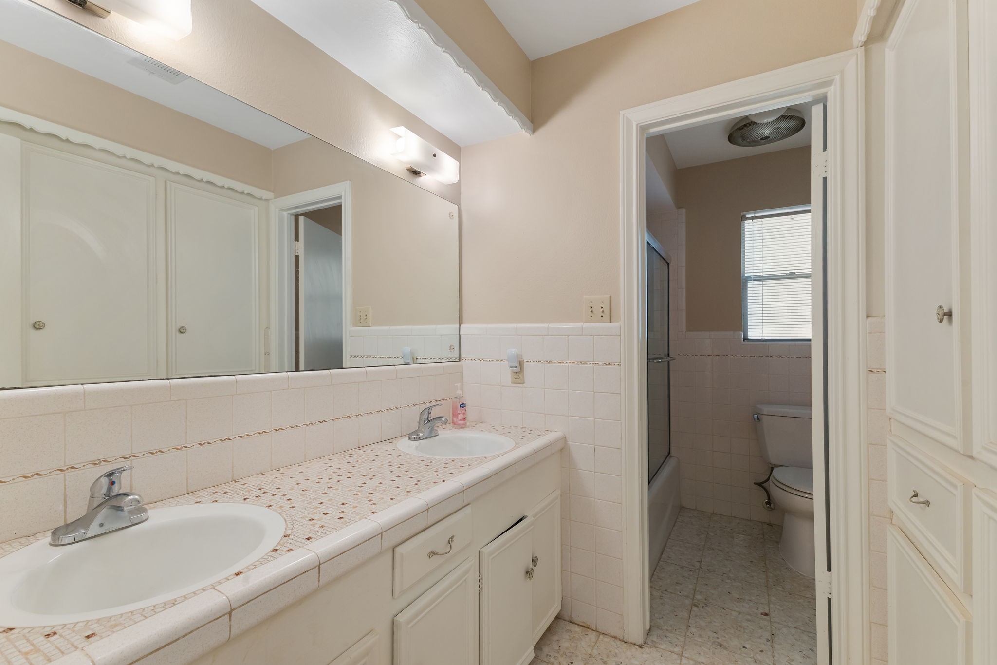 460 Dover Lane Spring, TX 77373 - Photo 27 of 47 a bathroom with a sink and a mirror