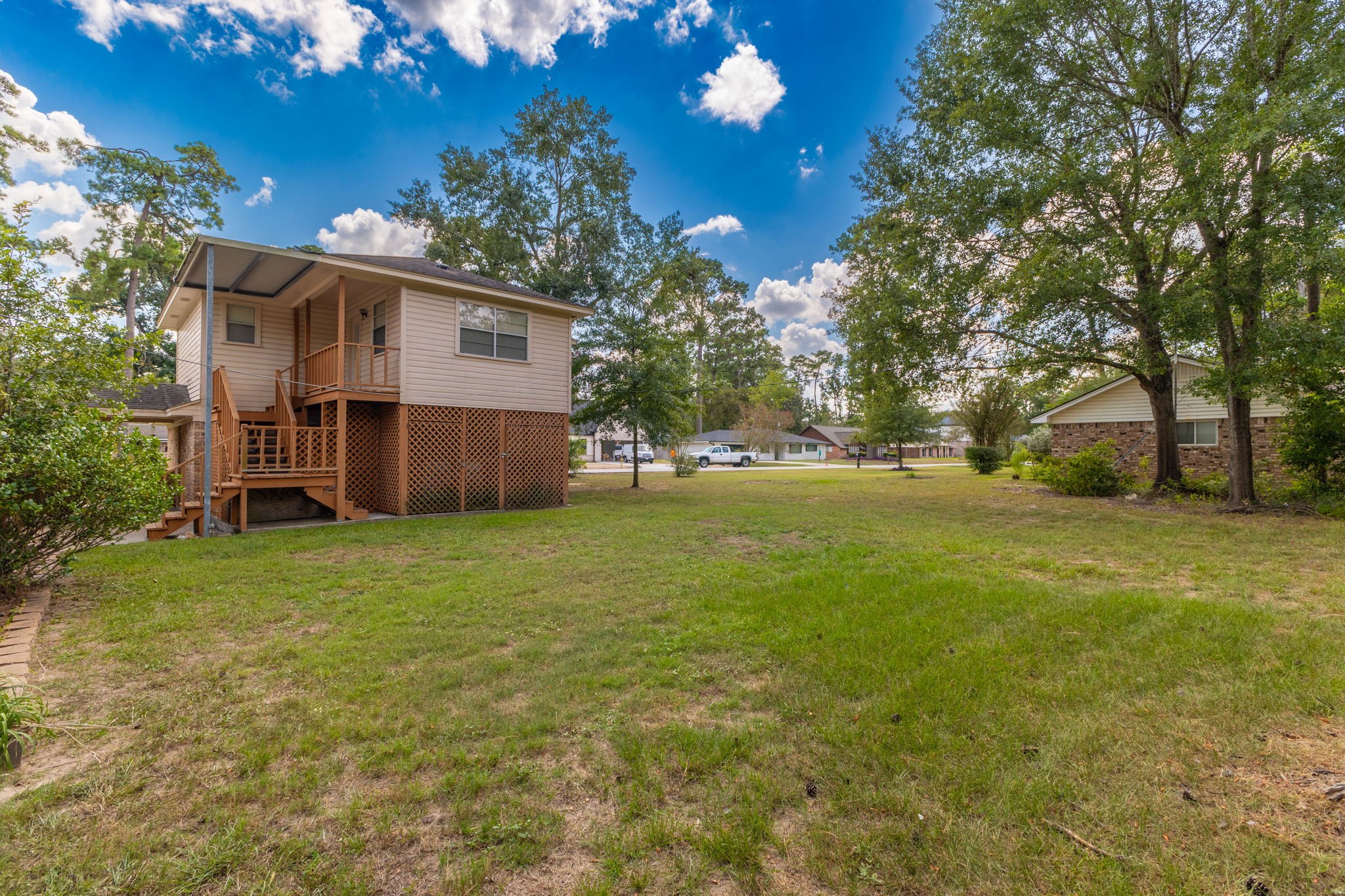 460 Dover Lane Spring, TX 77373 - Photo 33 of 47 a view of a house with backyard and garden