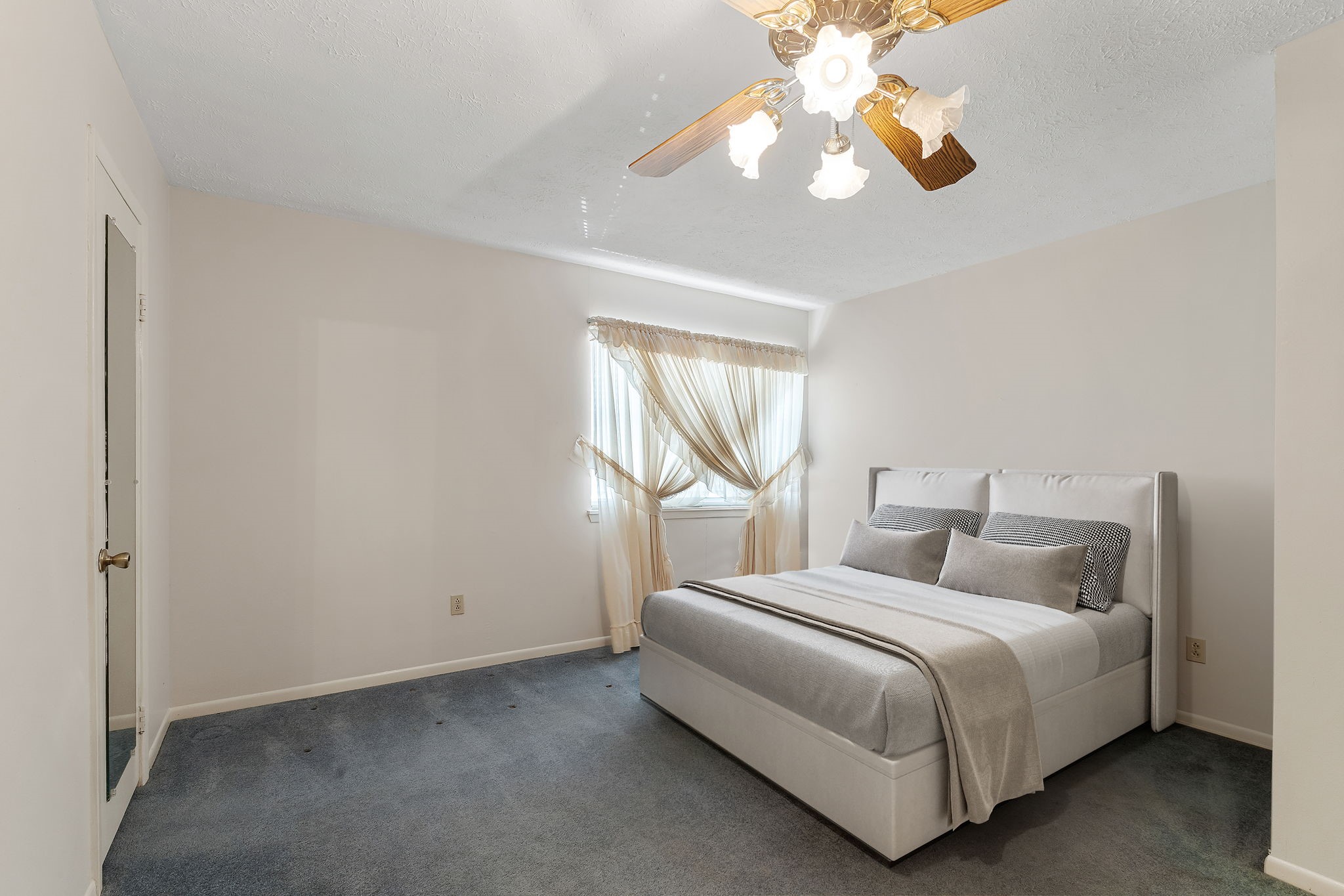 460 Dover Lane Spring, TX 77373 - Photo 38 of 47 a bedroom with a bed and a chandelier