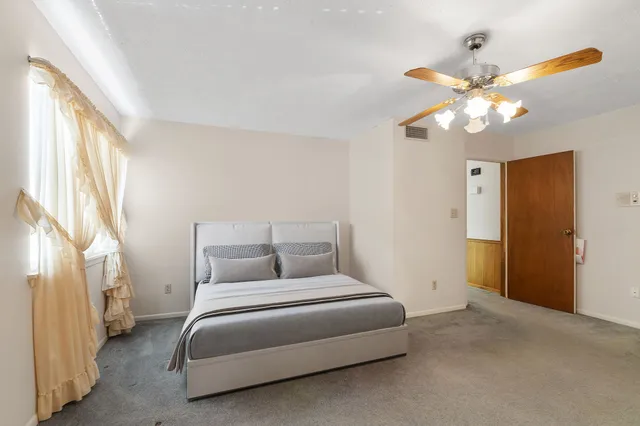 a view of a house with a swimming pool