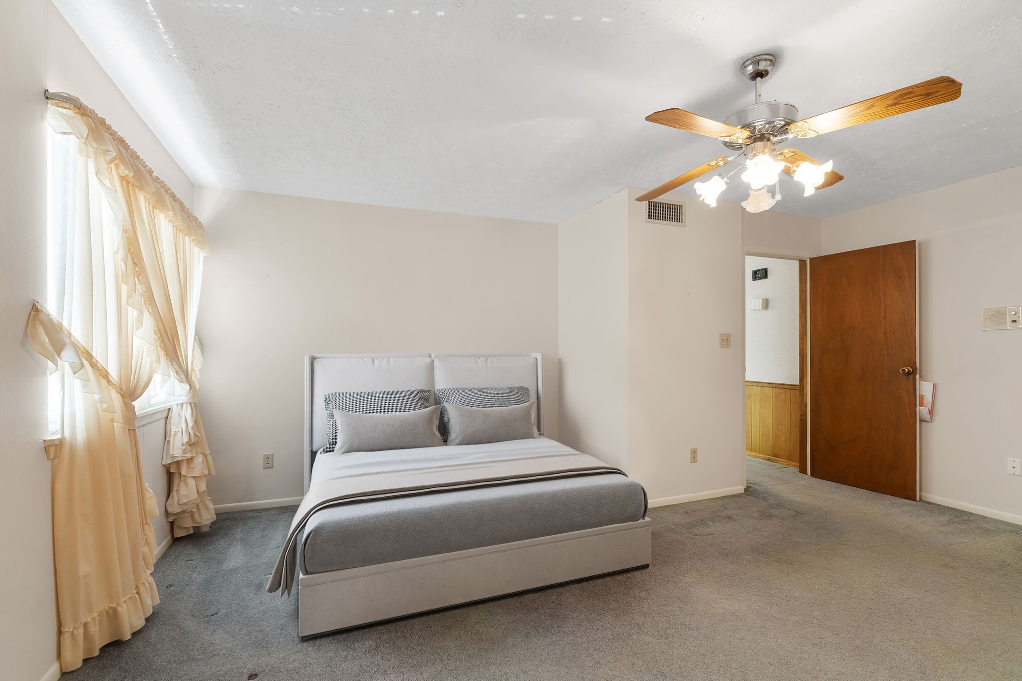 460 Dover Lane Spring, TX 77373 - Photo 39 of 47 a bedroom with a bed and a chandelier