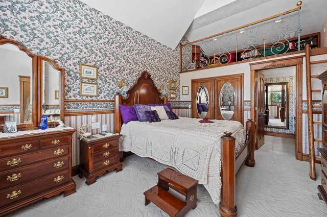 a bathroom with a granite countertop bathtub sink and toilet