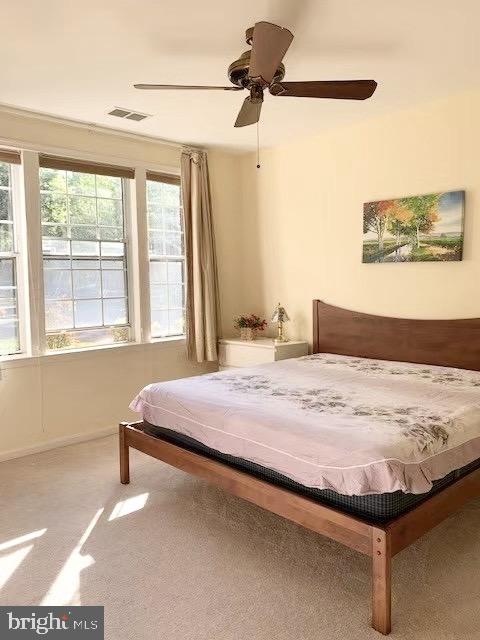7037 Haycock Road, Unit A Falls Church, VA 22043 - Photo 5 of 10 a bedroom with a bed and a window