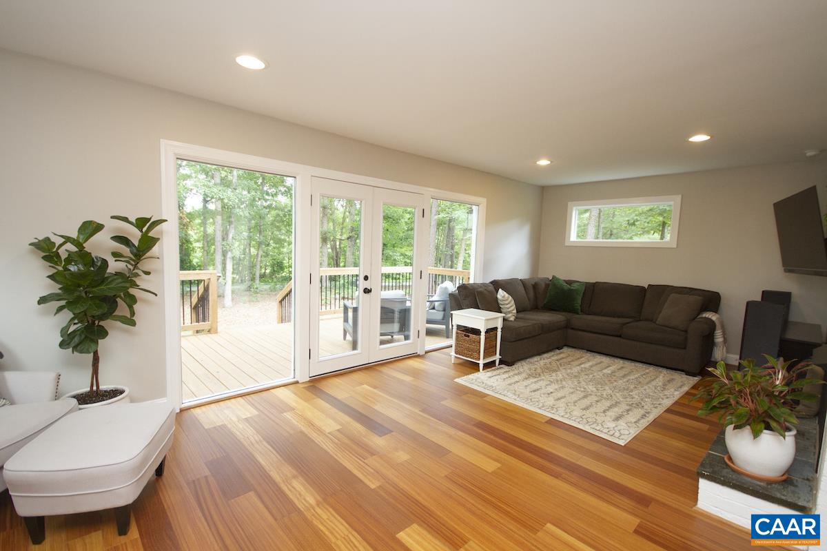 2750 Rio Mills Road Earlysville, VA 22936 - Photo 3 of 32 a living room with furniture and a large window