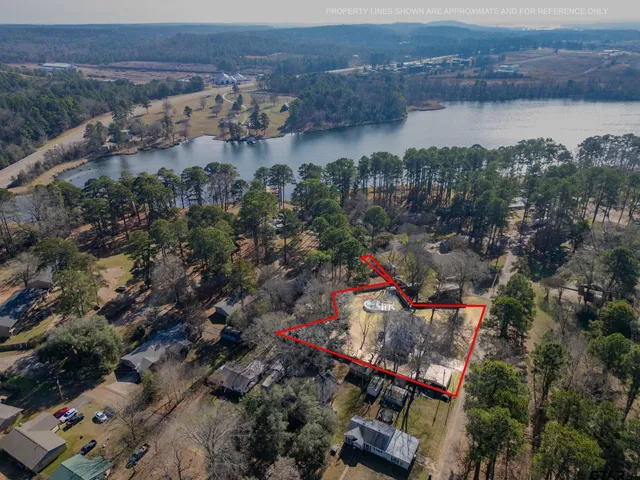 an aerial view of a houses with outdoor space