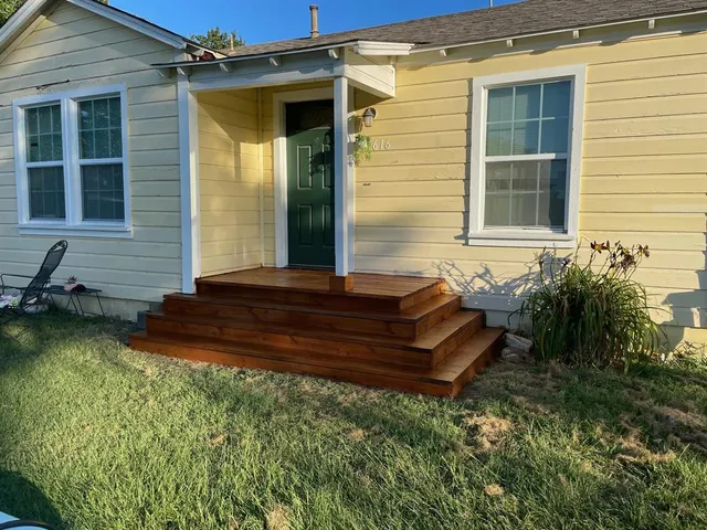 a house view with a garden space