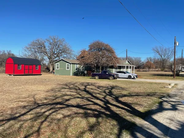a bathroom with a sink toilet and a mirror