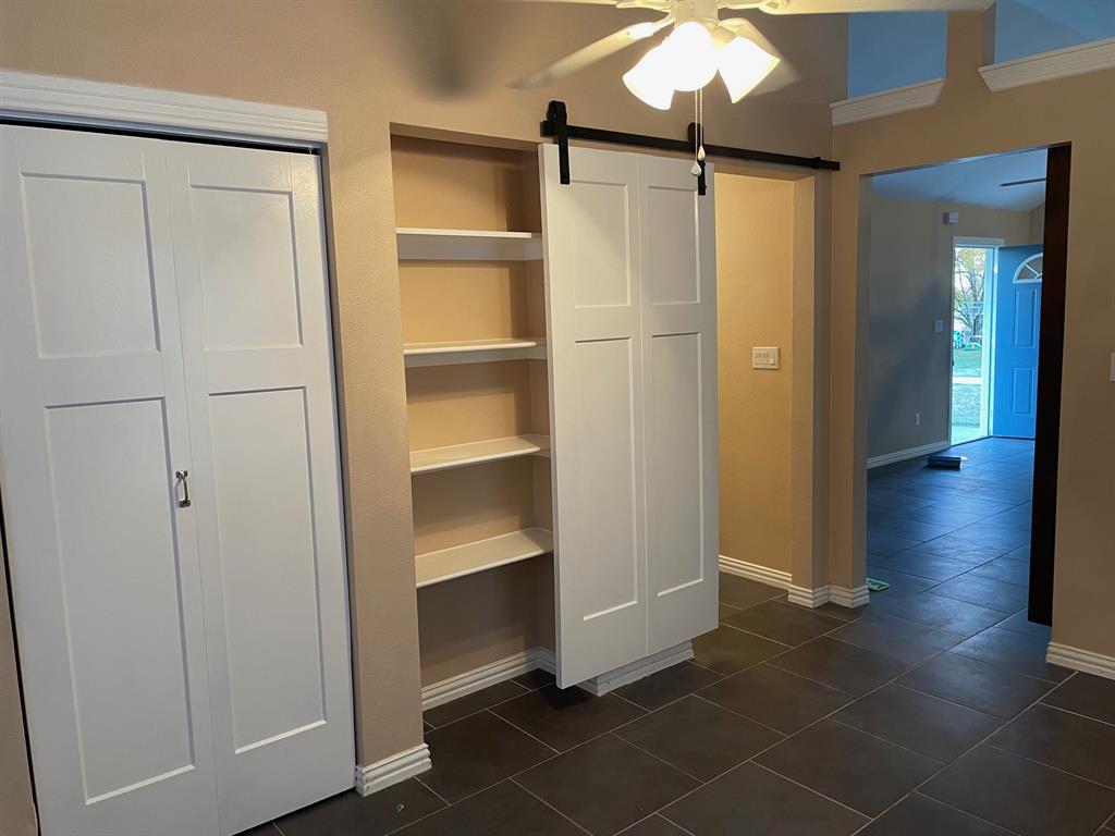 1610 Newsom Mound Road Springtown, TX 76082 - Photo 36 of 40 a view of a room with wooden floor