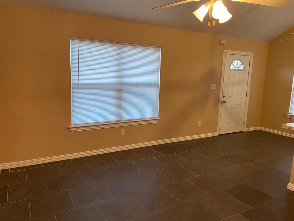 1610 Newsom Mound Road Springtown, TX 76082 - Photo 38 of 40 an empty room with a empty space and a window
