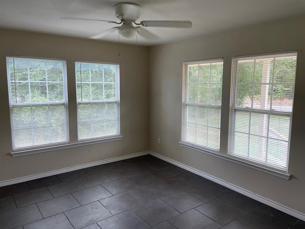 1610 Newsom Mound Road Springtown, TX 76082 - Photo 7 of 40 an empty room with a window