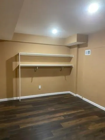 a view of a room with an empty space