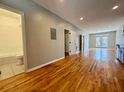 a view of a livingroom with wooden floor