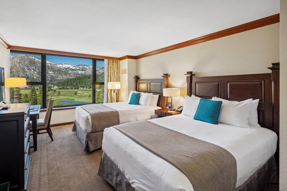 400 Resort Road, Unit 710712 Olympic Valley, CA 96146 - Photo 14 of 28 a bedroom with two beds and large windows