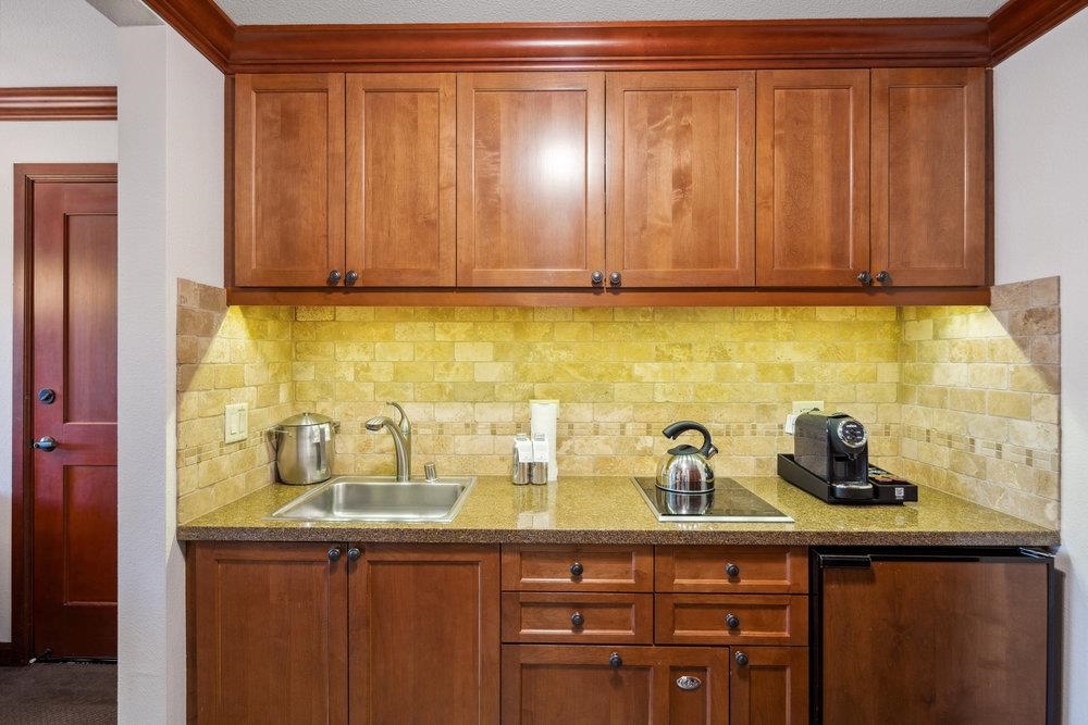 400 Resort Road, Unit 710712 Olympic Valley, CA 96146 - Photo 6 of 28 a kitchen with a sink and cabinets