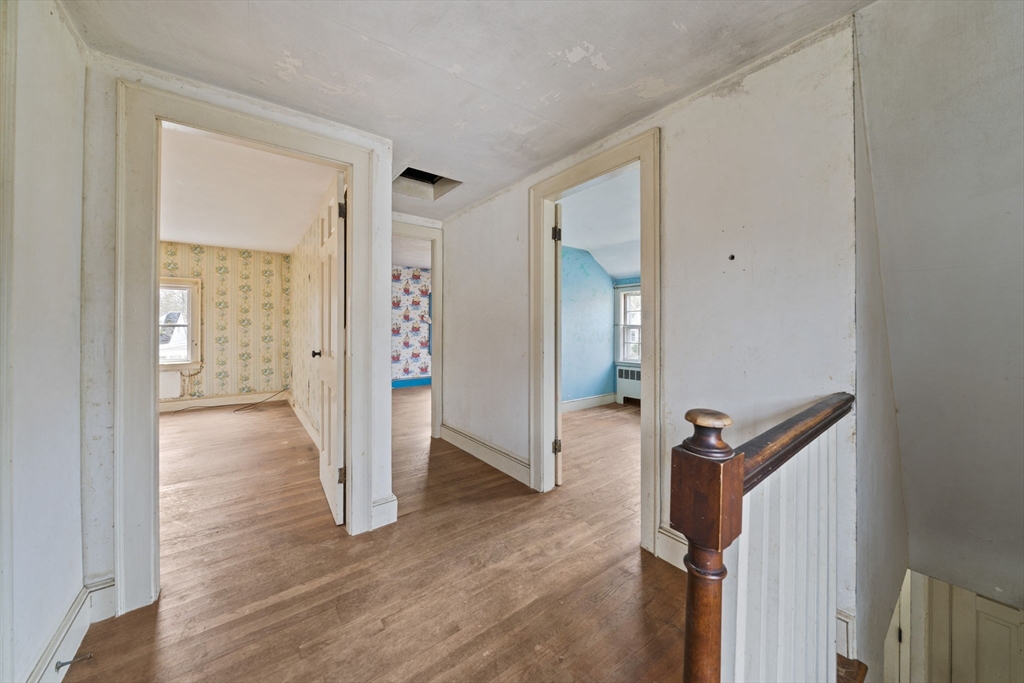 24 Butler Road Hingham, MA 02043 - Photo 13 of 38 a view of empty room with wooden floor