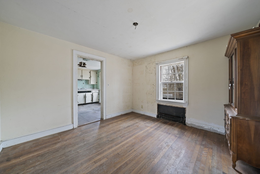24 Butler Road Hingham, MA 02043 - Photo 7 of 38 an empty room with windows and closet