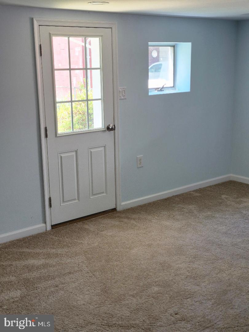 4812 Topping Road Rockville, MD 20852 - Photo 15 of 22 Basement Door to Yard in from Large Rec Room
