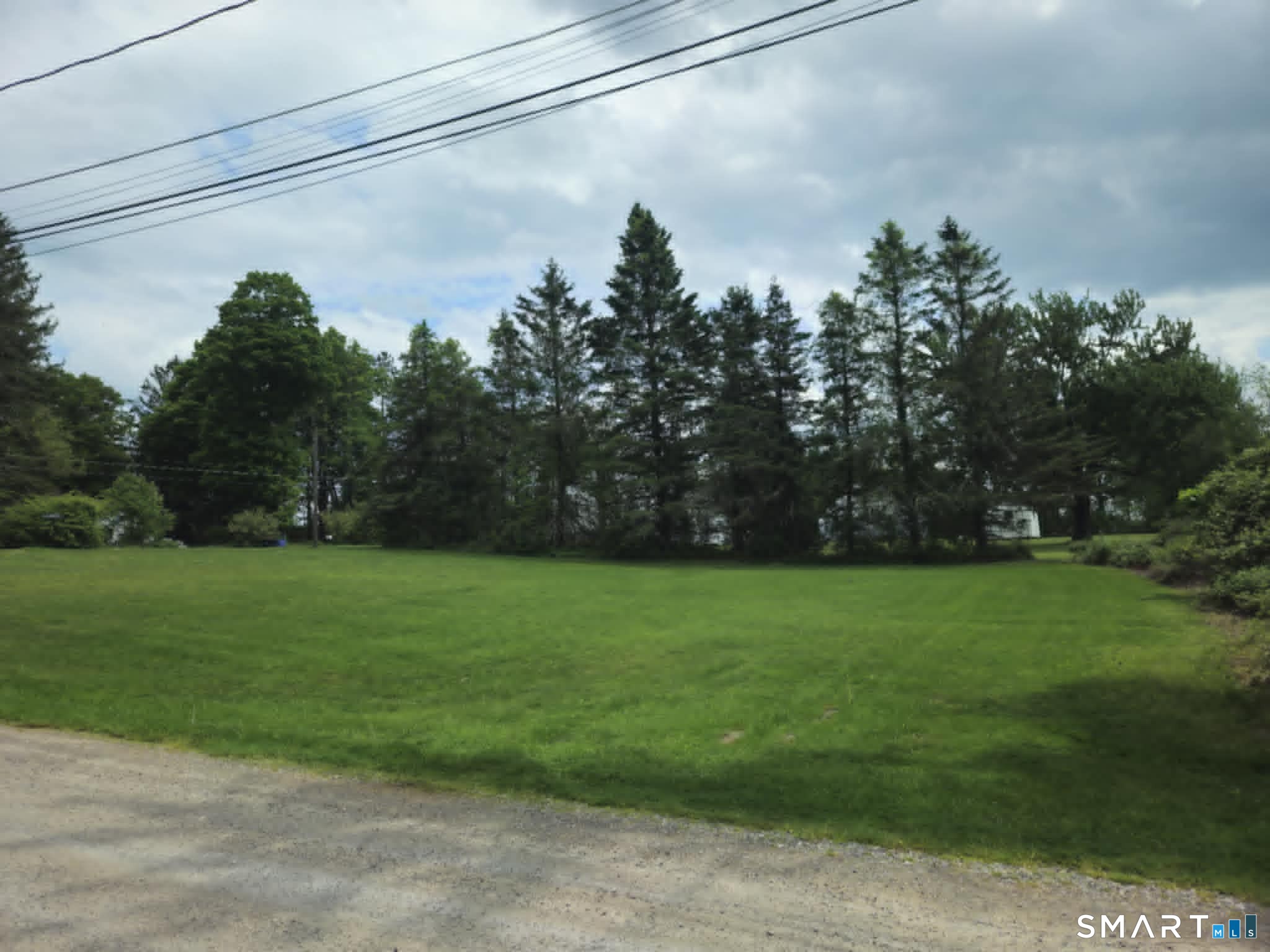 Baxter Road Woodstock, CT 06281 - Photo 2 of 4 a view of a green yard