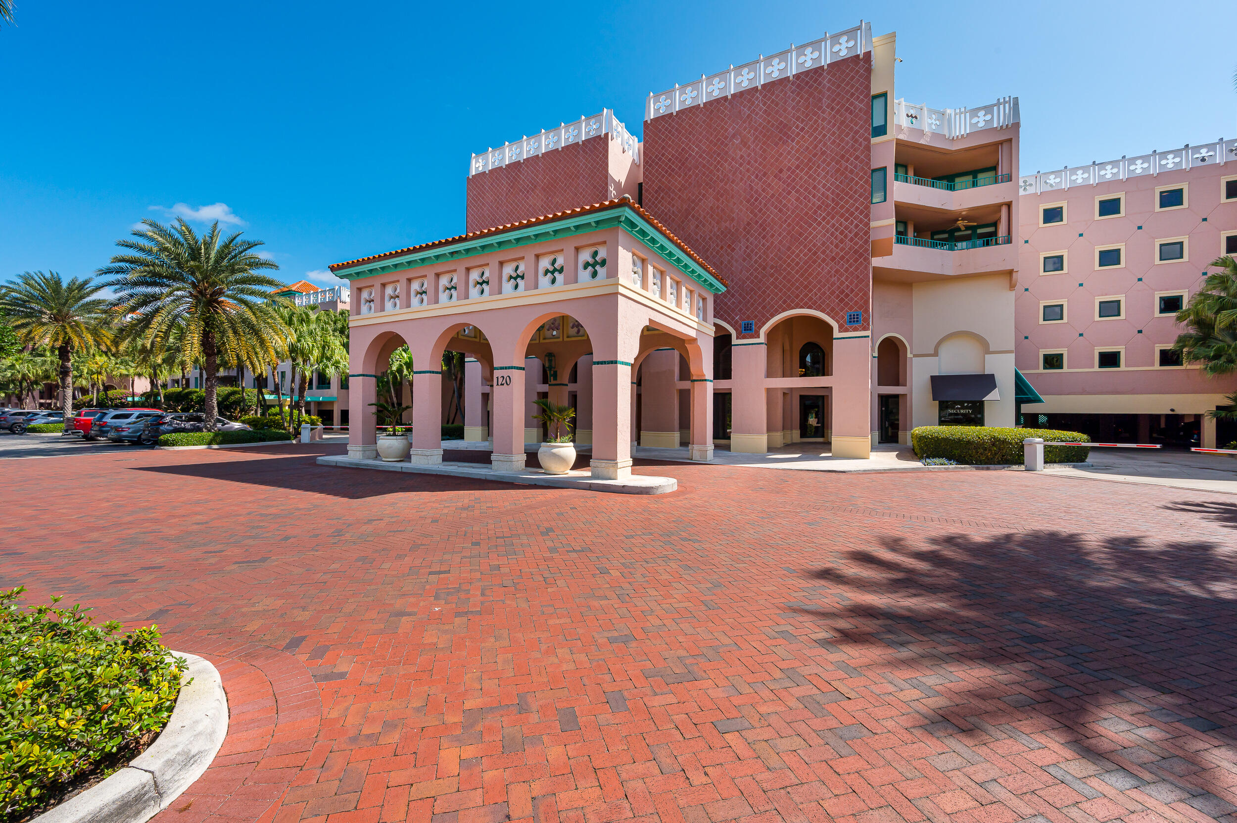 120 Southeast 5th Avenue, Unit PH22 Boca Raton, FL 33432 - Photo 23 of 32 front view of a building with a yard