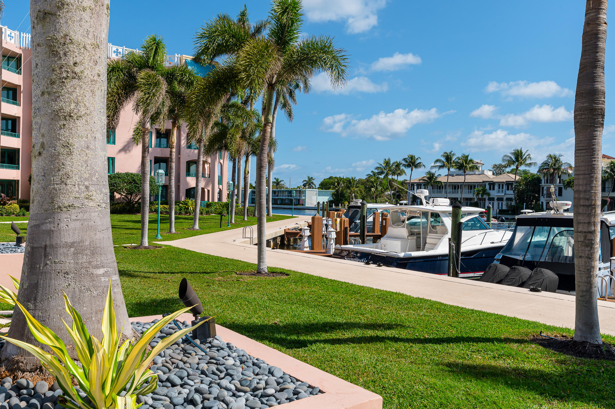 120 Southeast 5th Avenue, Unit PH22 Boca Raton, FL 33432 - Photo 27 of 32 a view of a park with swings and slides