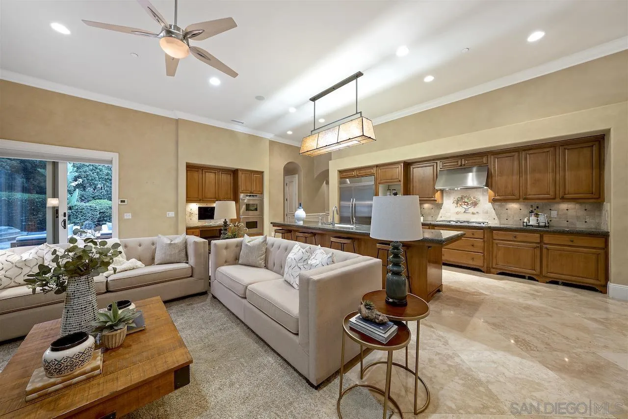 16644 Valle Verde Road Poway, CA 92064 - Photo 20 of 37 a living room with furniture and kitchen view