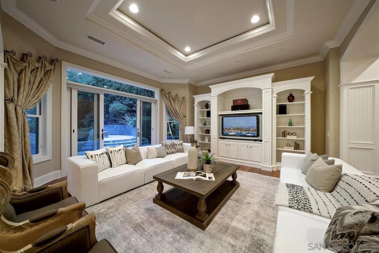 16644 Valle Verde Road Poway, CA 92064 - Photo 3 of 37 a living room with furniture and a flat screen tv