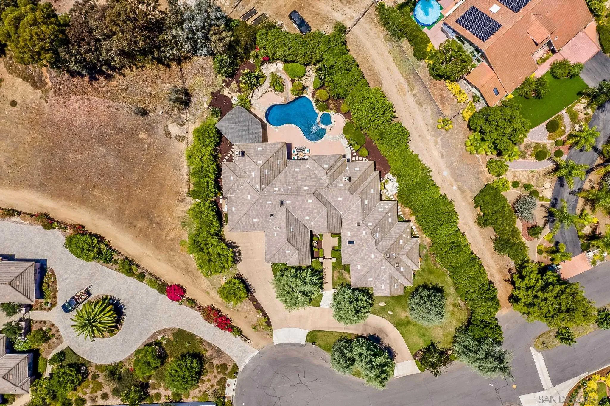 16644 Valle Verde Road Poway, CA 92064 - Photo 34 of 37 an aerial view of a house with a yard and garden