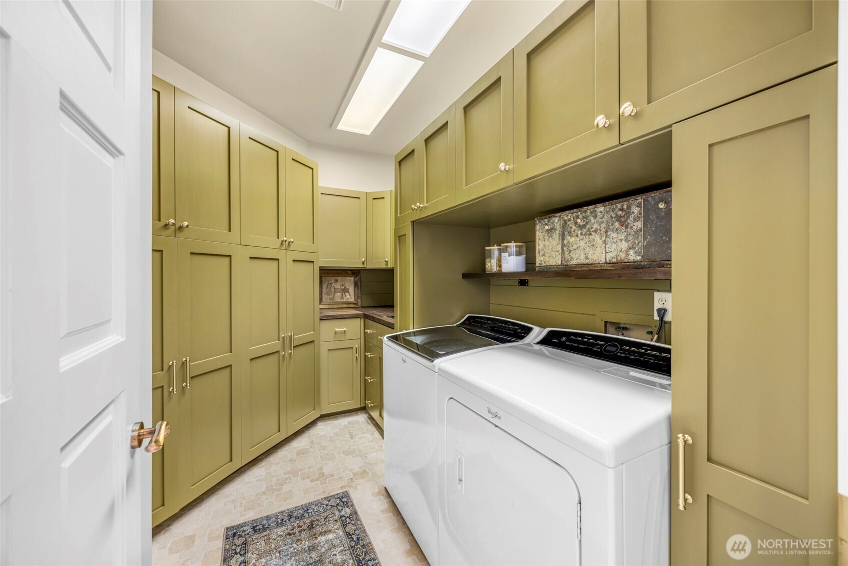 6591 Northeast North Shore Road Belfair, WA 98528 - Photo 21 of 37 a kitchen with a sink cabinets and appliances