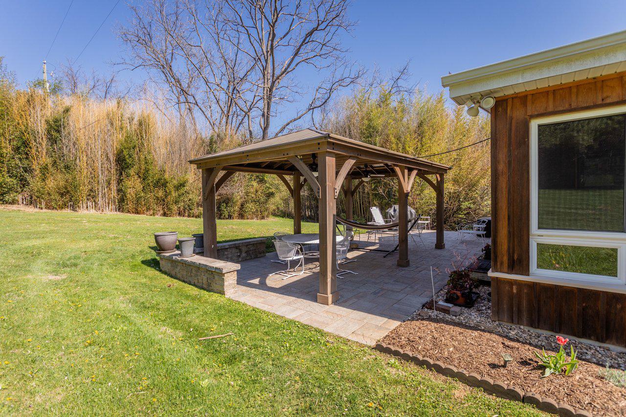 143 Scheffer Gap Road Woodstock, VA 22664 - Photo 6 of 49 Large concrete patio located off of sunroom.