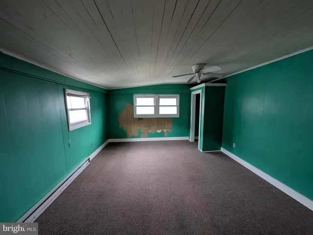 a view of a room that has a window