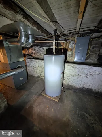 a view of a room with wooden walls