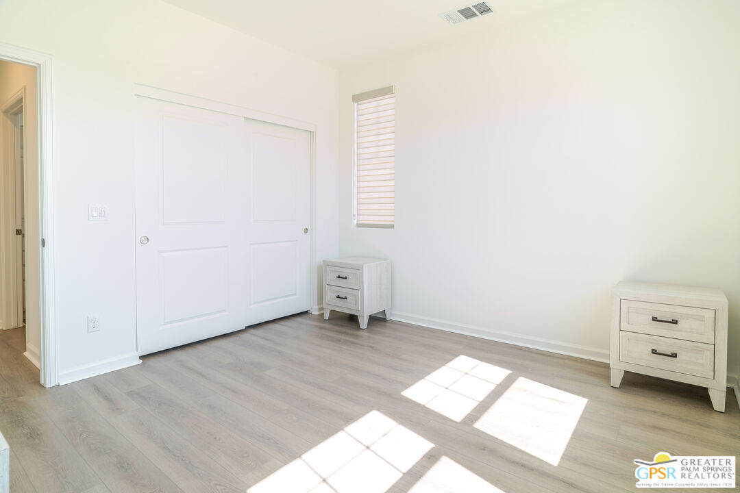 78924 Santa Rosa Way Palm Desert, CA 92211 - Photo 12 of 71 a view of an empty room and a window