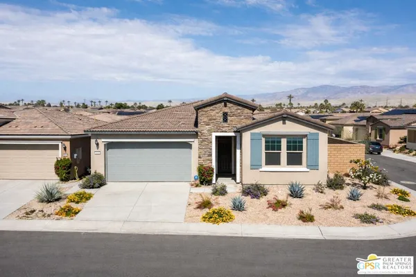 an aerial view of a house with a outdoor space