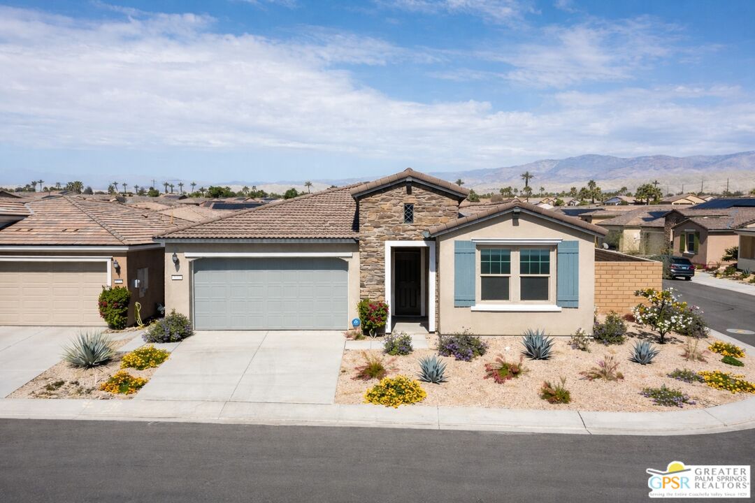 78924 Santa Rosa Way Palm Desert, CA 92211 - Photo 2 of 71 front view of a house with a yard