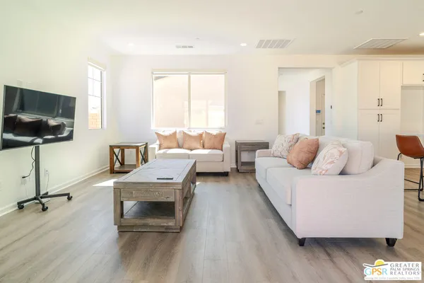 a bathroom with a sink vanity granite and a mirror