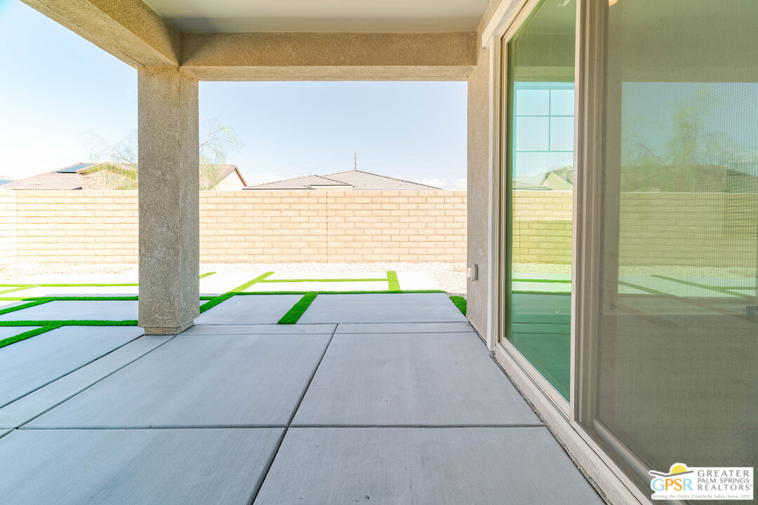 78924 Santa Rosa Way Palm Desert, CA 92211 - Photo 57 of 71 a view of an empty room and a window