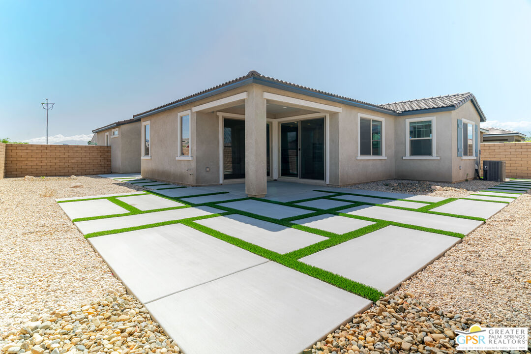 78924 Santa Rosa Way Palm Desert, CA 92211 - Photo 60 of 71 a house with swimming pool in front of it