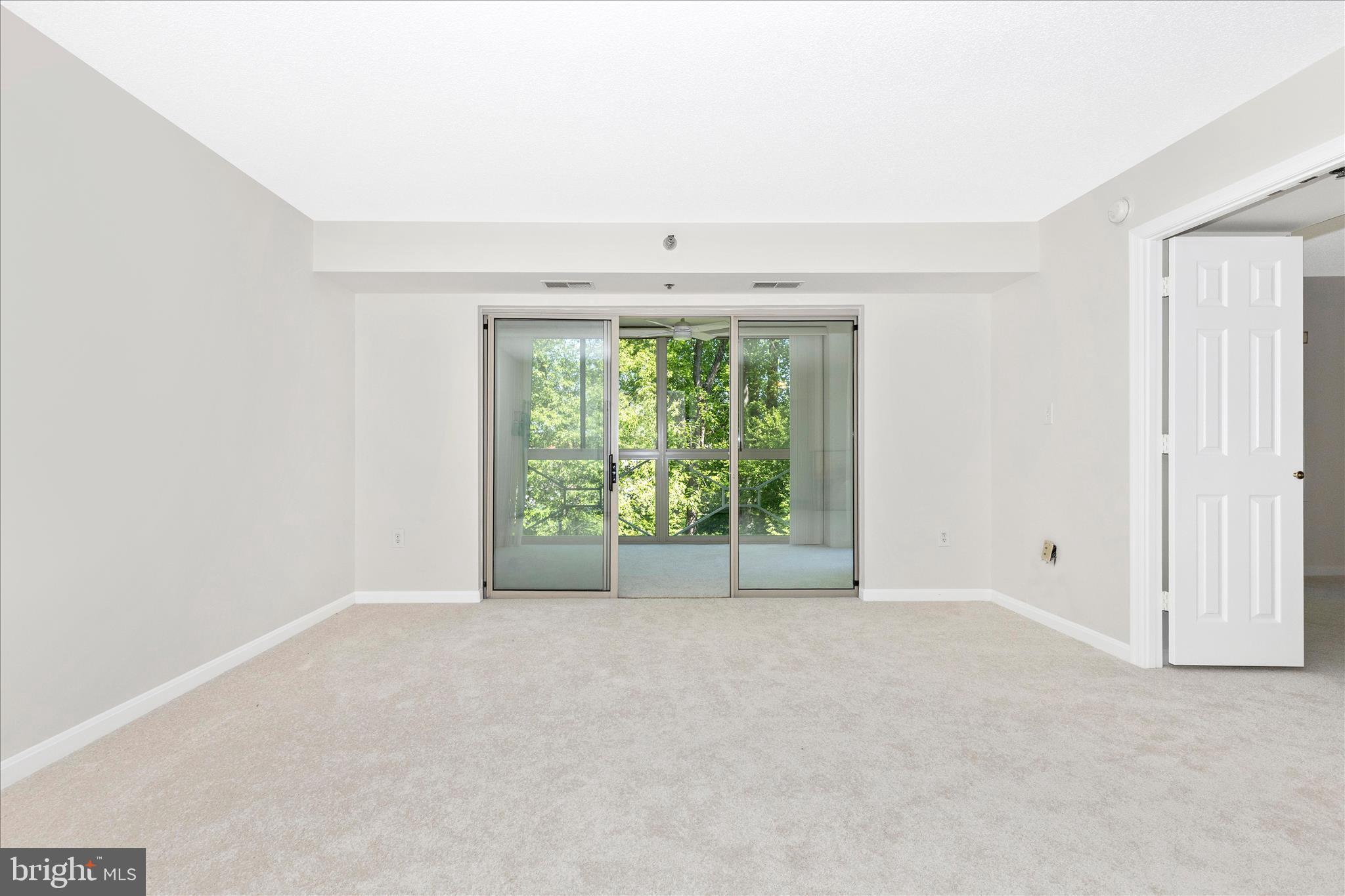 14809 Pennfield Circle, Unit 309 Silver Spring, MD 20906 - Photo 13 of 64 a view of an empty room with a window