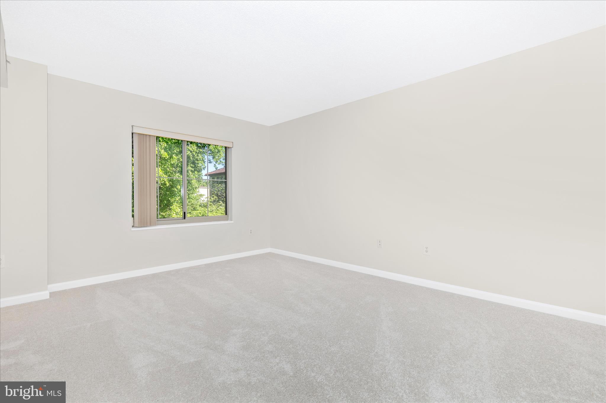 14809 Pennfield Circle, Unit 309 Silver Spring, MD 20906 - Photo 16 of 64 an empty room with windows