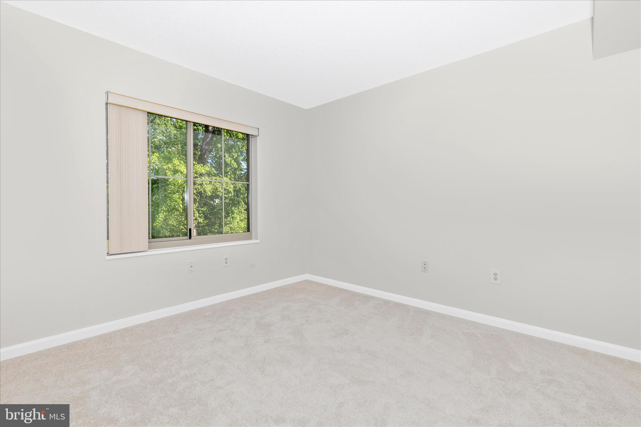 14809 Pennfield Circle, Unit 309 Silver Spring, MD 20906 - Photo 22 of 64 an empty room with a window