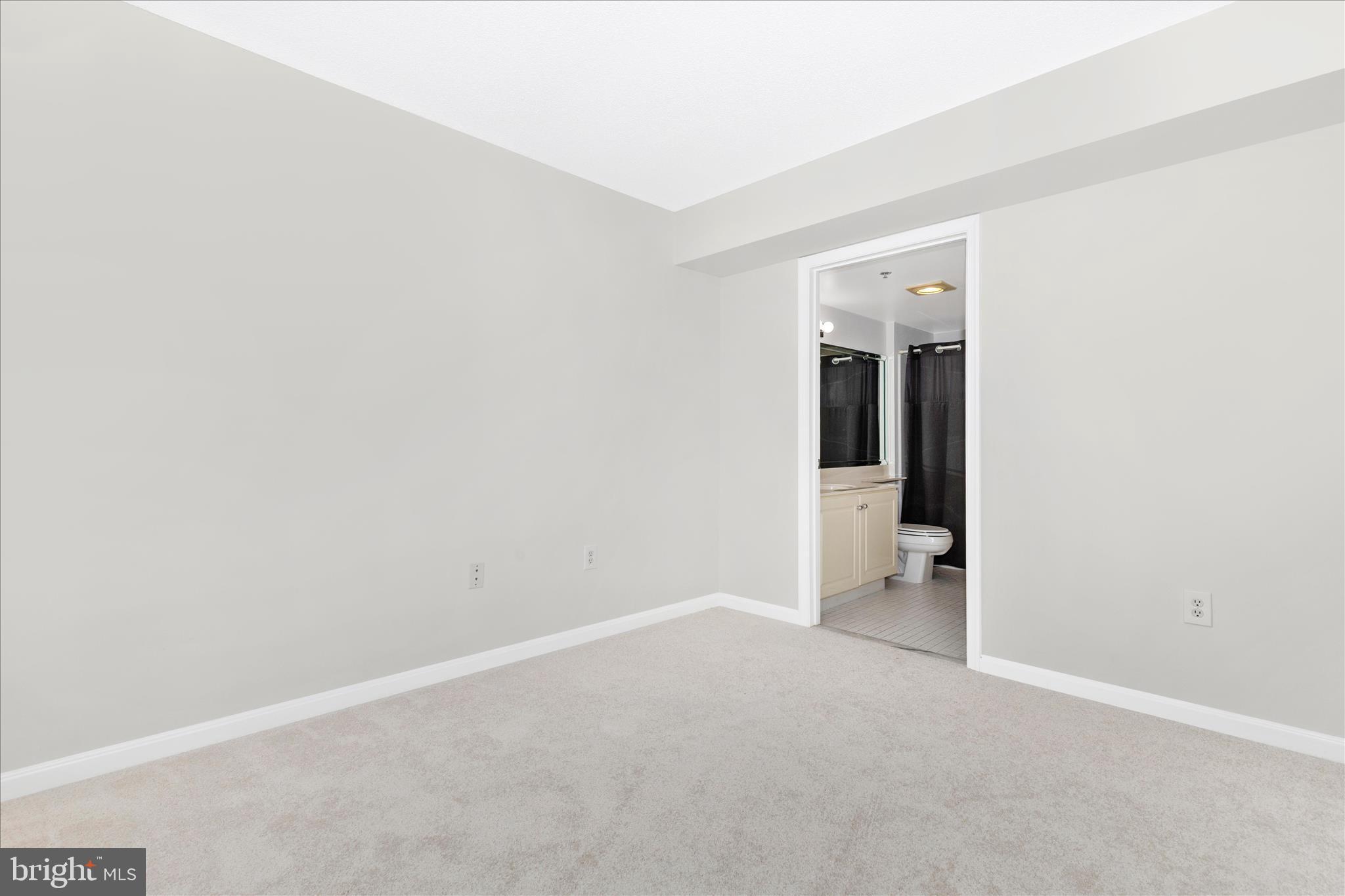 14809 Pennfield Circle, Unit 309 Silver Spring, MD 20906 - Photo 25 of 64 an empty room with an entrance