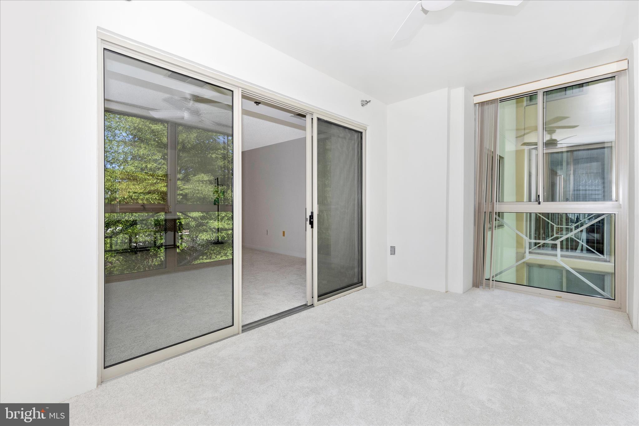 14809 Pennfield Circle, Unit 309 Silver Spring, MD 20906 - Photo 32 of 64 an empty room with windows