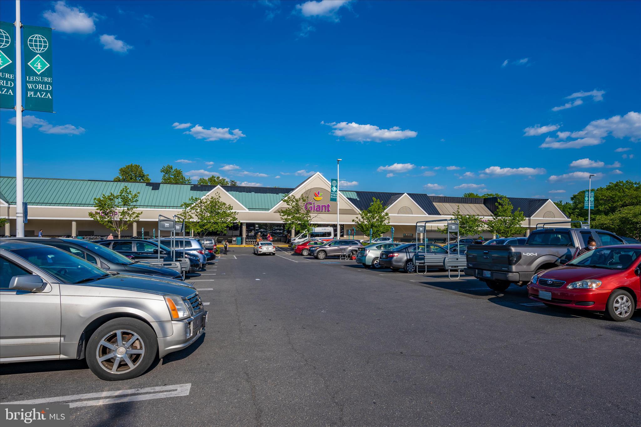 14809 Pennfield Circle, Unit 309 Silver Spring, MD 20906 - Photo 56 of 64 a view of a car park in front of a house