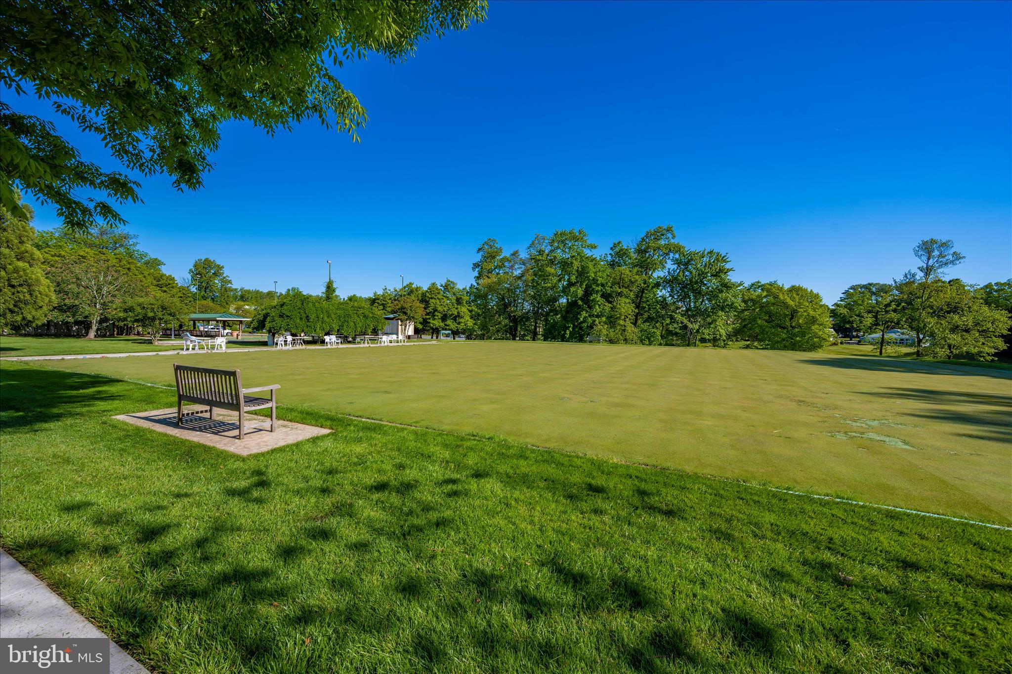 14809 Pennfield Circle, Unit 309 Silver Spring, MD 20906 - Photo 59 of 64 a view of a lake with a yard