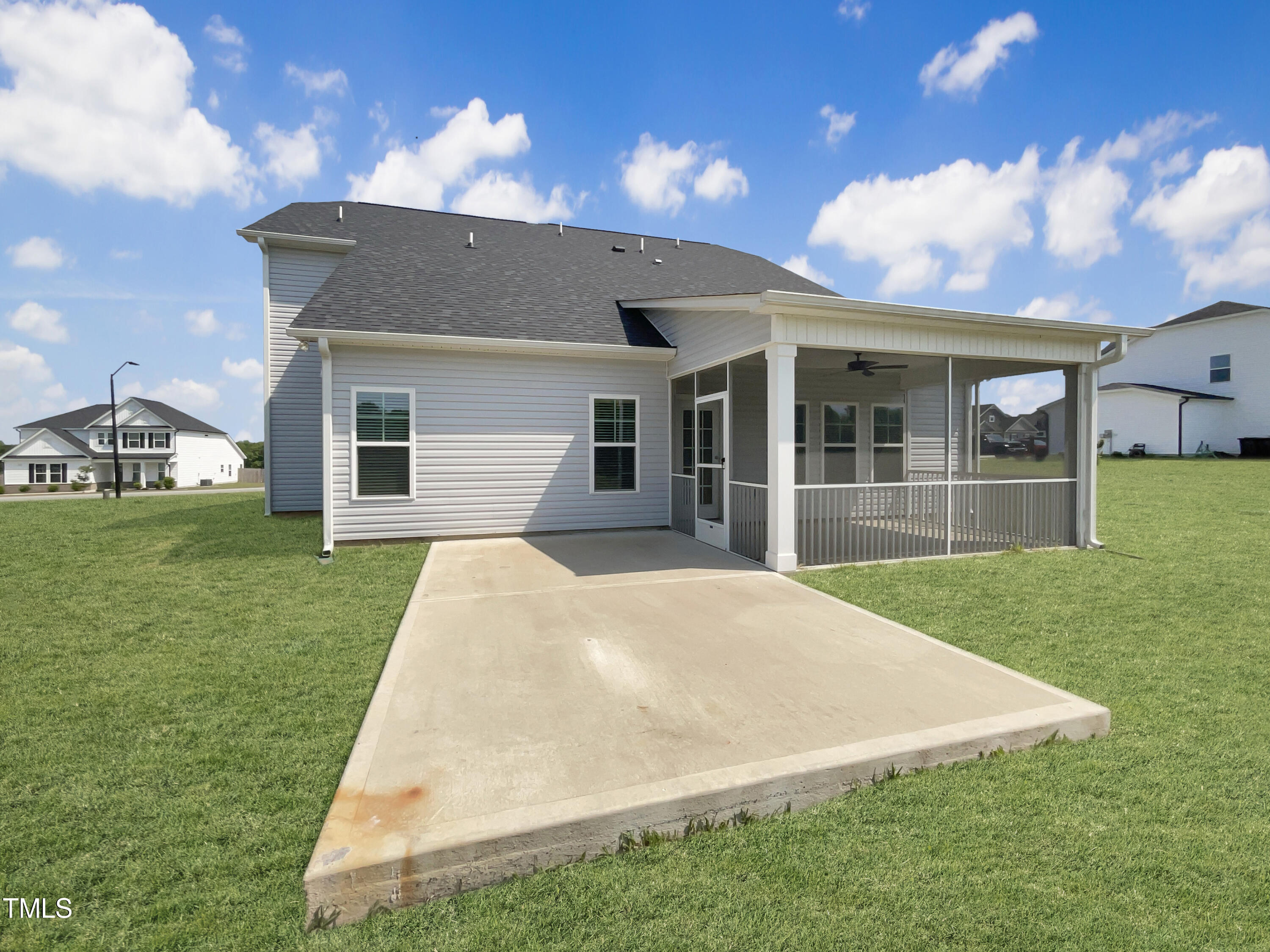 197 Steep Rock Drive Willow Spring, NC 27592 - Photo 20 of 20 a view of a house with a backyard